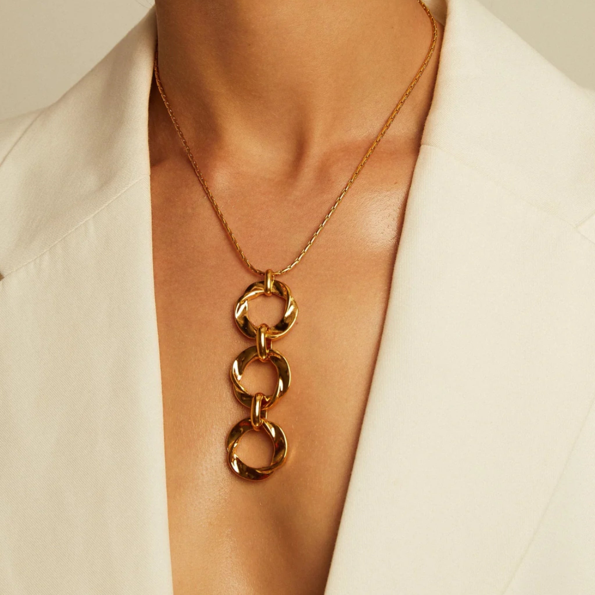 Collar Tres Círculos Dorados - Piedra de Toque